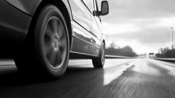 Low angle view of a car driving on the highway