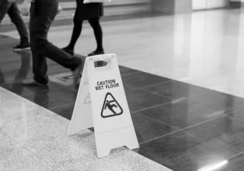 A sign that says "Caution, wet floor"